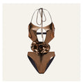 Gold women's halter neck one-piece swimsuit with hollow-out design on mannequin