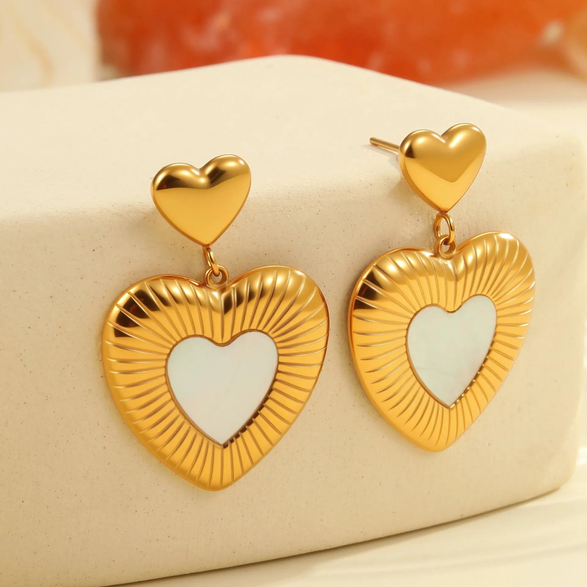 Gold heart-shaped stainless steel earrings with 18K electroplating for women's office fashion