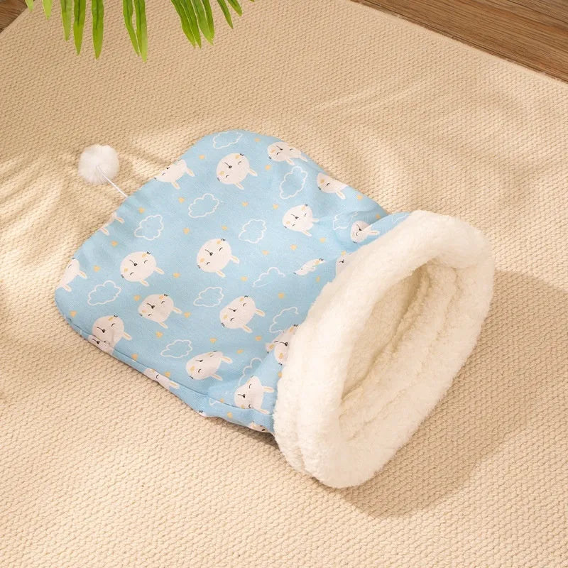 Pink Trojan pattern flannel cat sleeping bag nest bed measuring 50 by 40 centimetres.