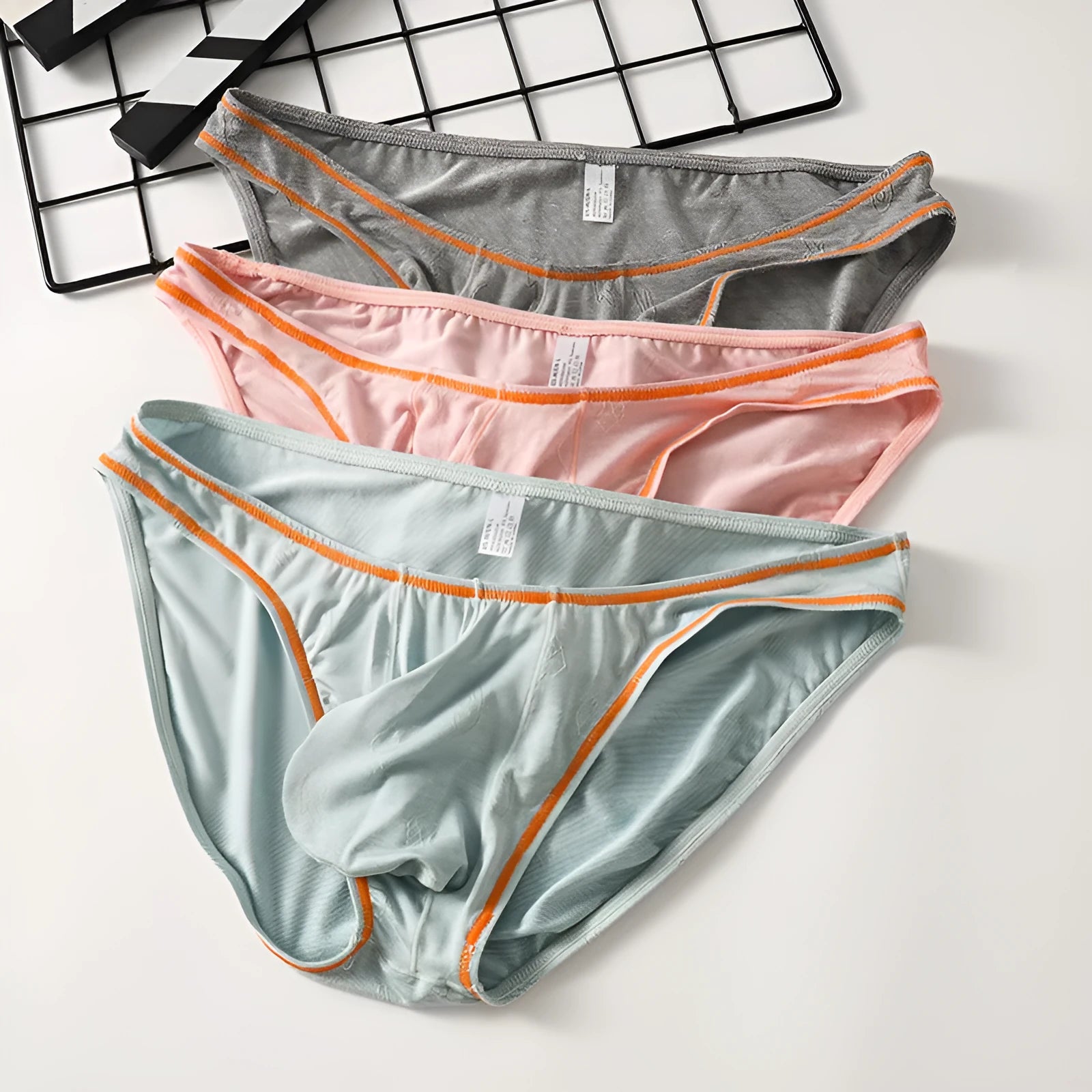Men's modal butt-lift underwear in colourful blue, showing contoured hip design
