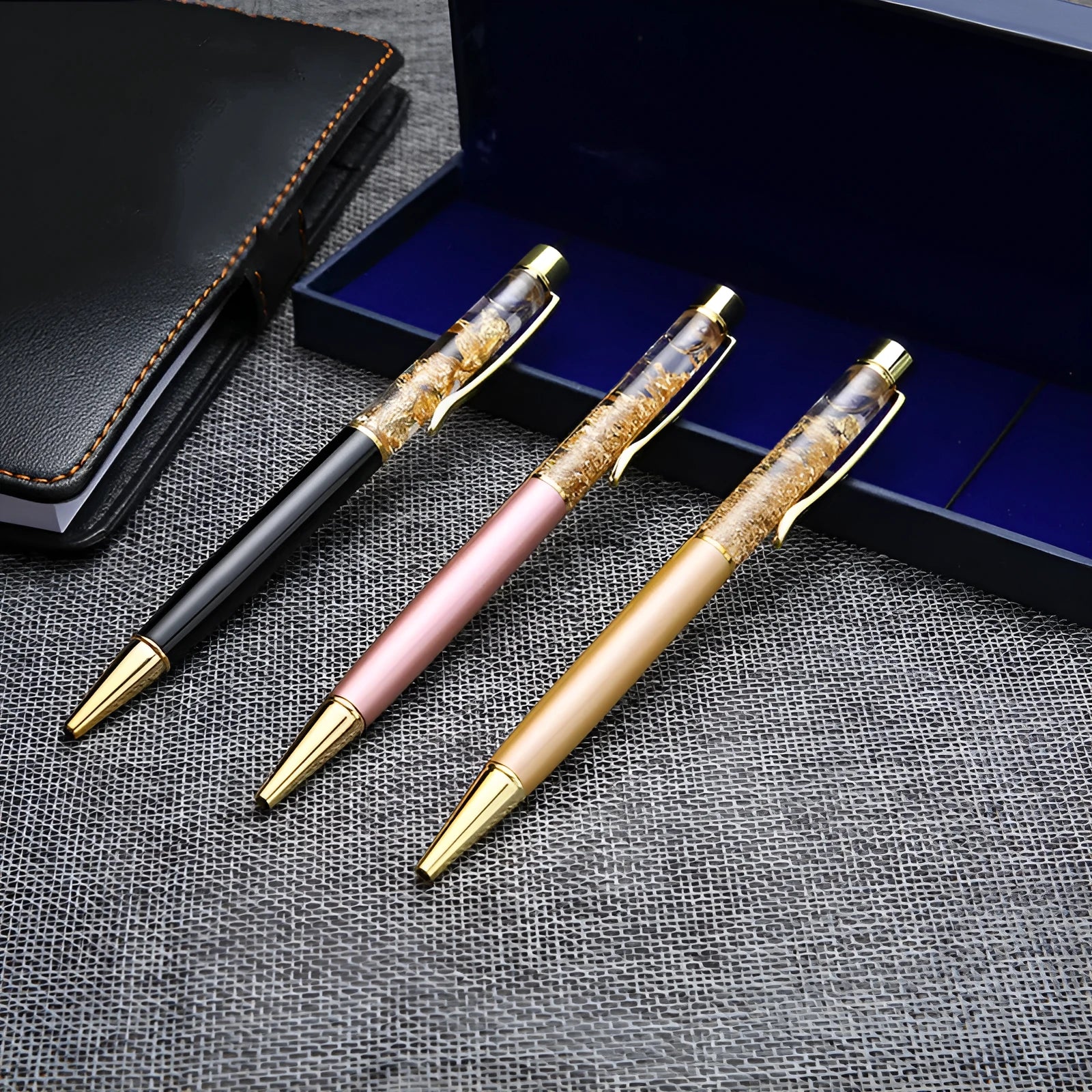 Gold foil metal ballpoint pen with 1mm tip and 13.8cm length