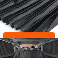 Retractable car sunshade curtain in black showing roller mechanism and opaque cloth material