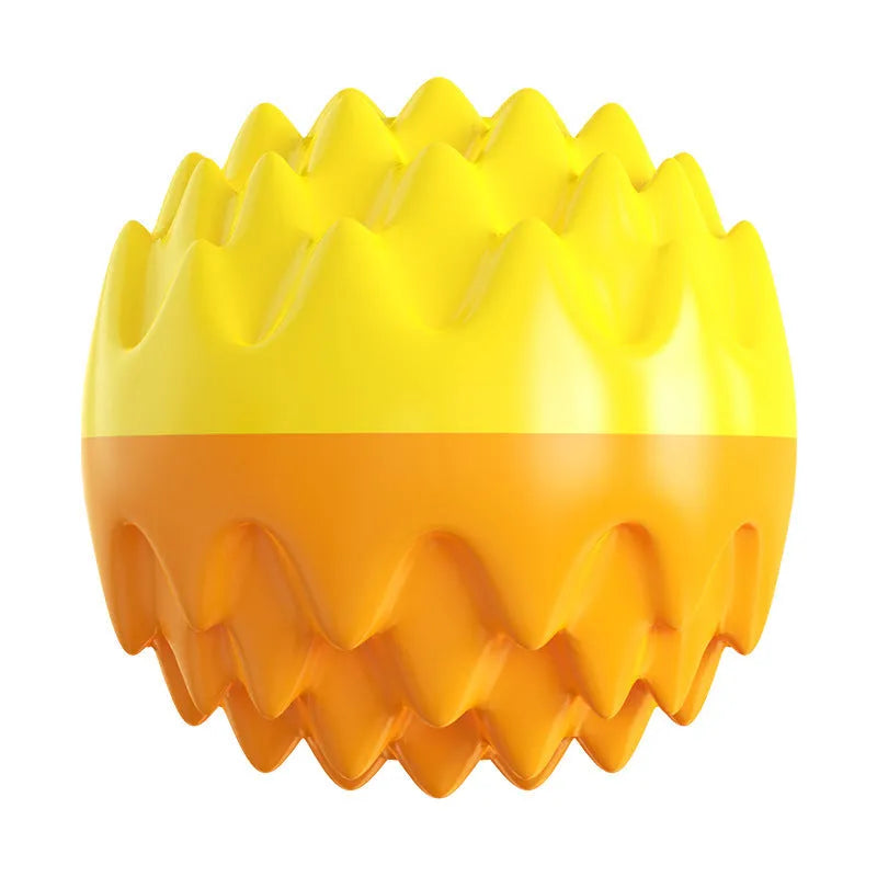 Blue and orange squeaky rubber dog ball with spiky texture for dental cleaning and aggressive chewers