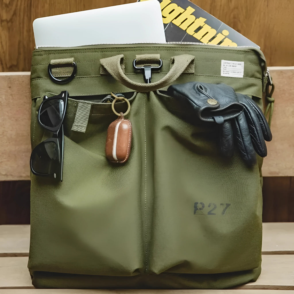 Medium nylon canvas messenger bag in military green with crossbody strap and laptop compartment