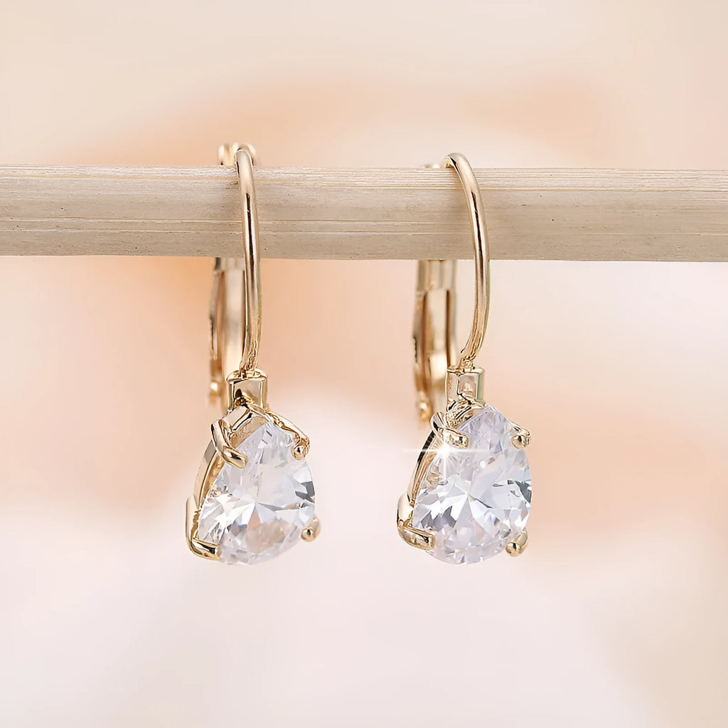 Copper drop-shaped fashion earrings with platinum plating and inlaid gem details.