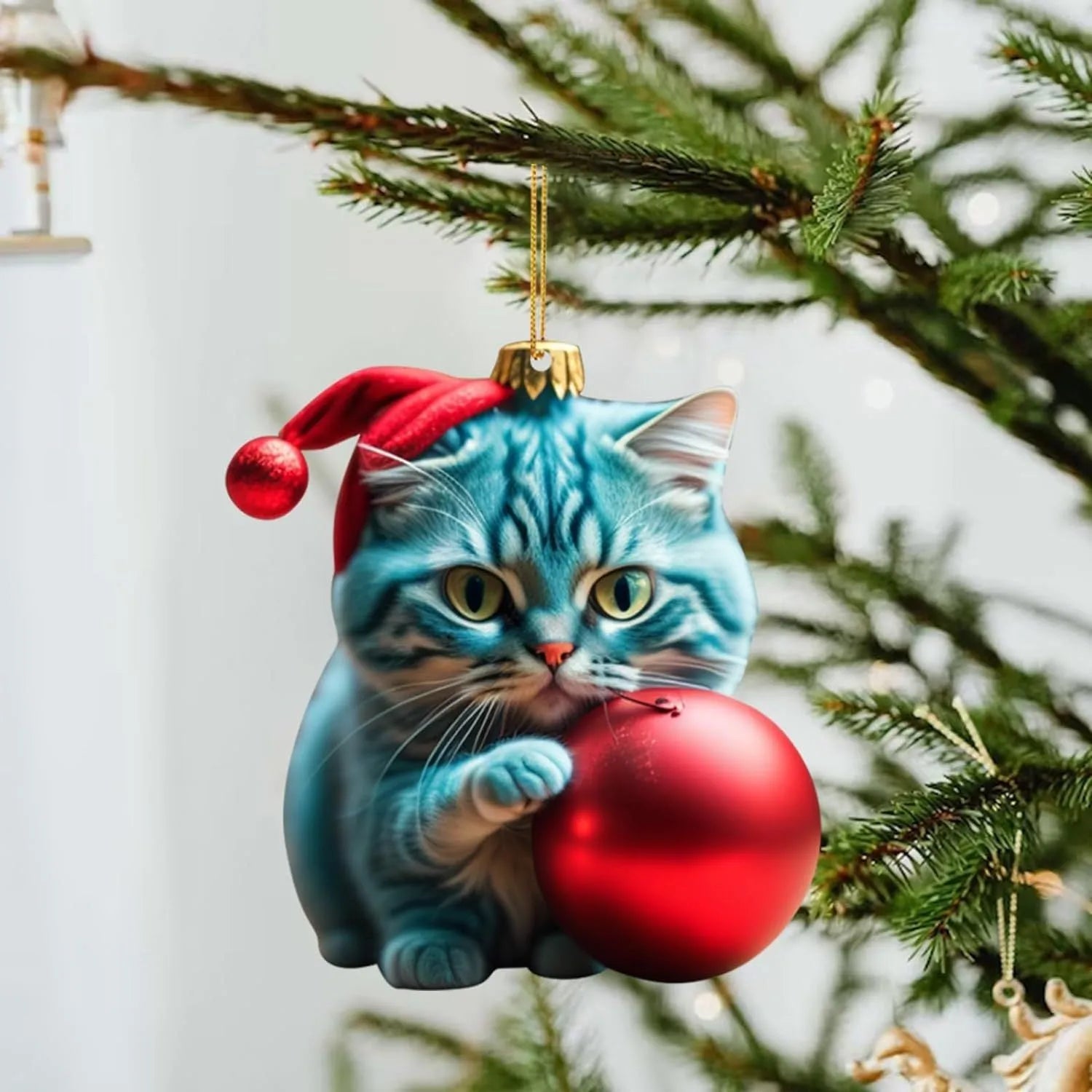 Cartoon style creative kitty Christmas ornament hanging in a car, made from clear acrylic.
