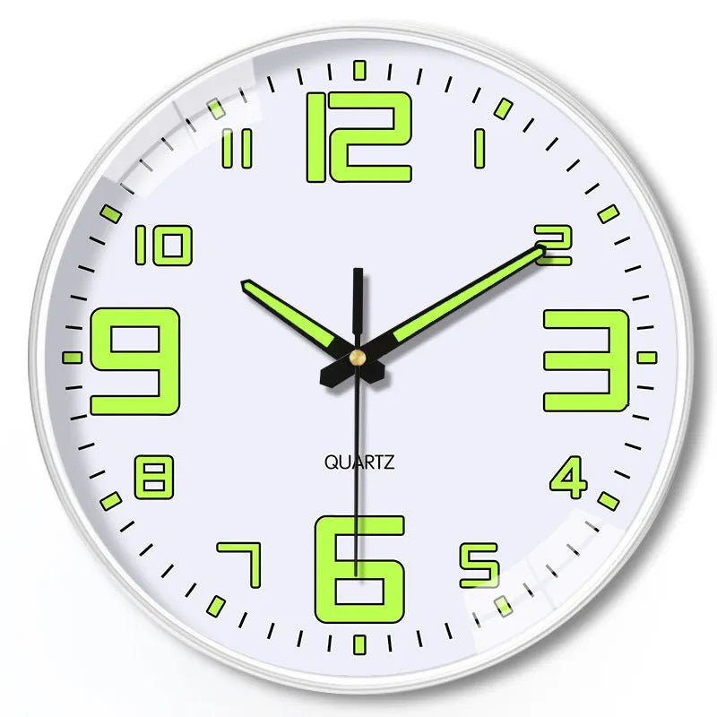 8 inch diameter modern wall clock with luminous hands on a wall.