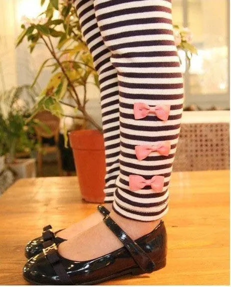 Pink cotton clothing set for girls showing coordinated pieces in children's sizes