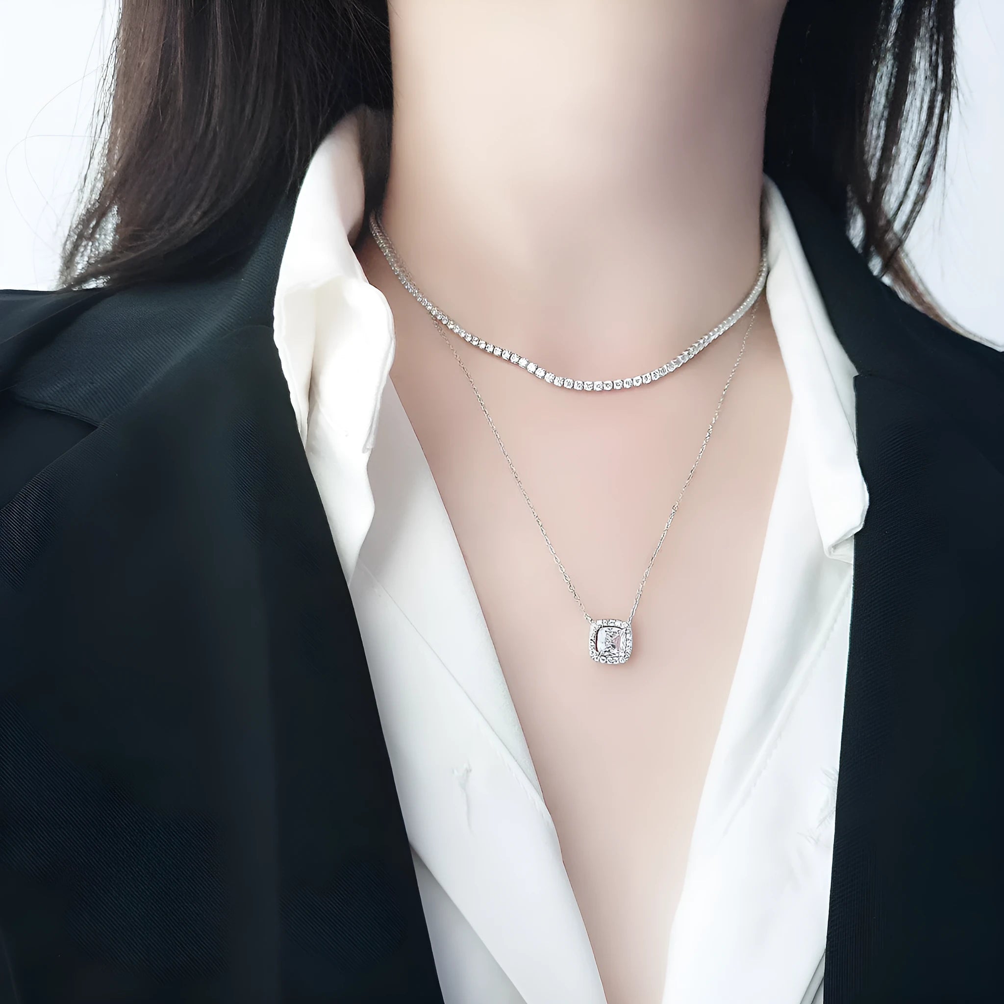 Women's sterling silver necklace with round diamond-cut pendant on silver chain