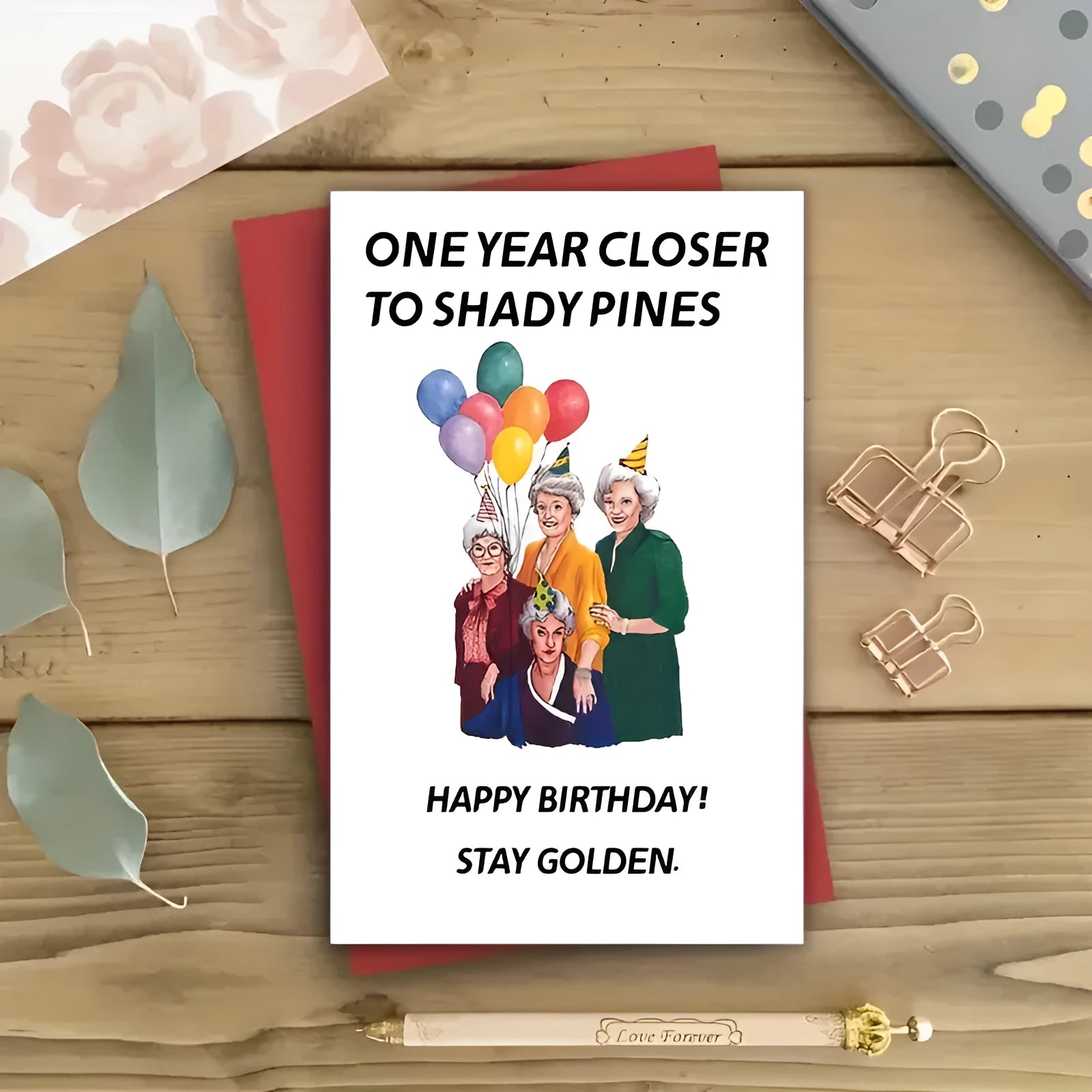 Simple printed birthday greeting card with a matching coloured or kraft paper envelope.