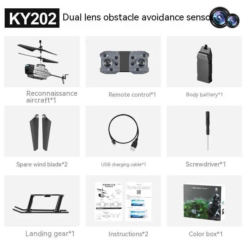 Heifeng grey plastic RC reconnaissance helicopter toy with coloured lights, remote control and accessories on a table.