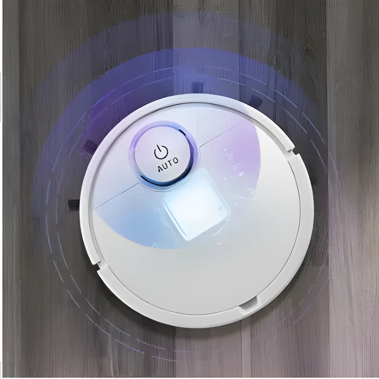 Automatic sweeping robot with a white ABS plastic housing on a wooden floor.
