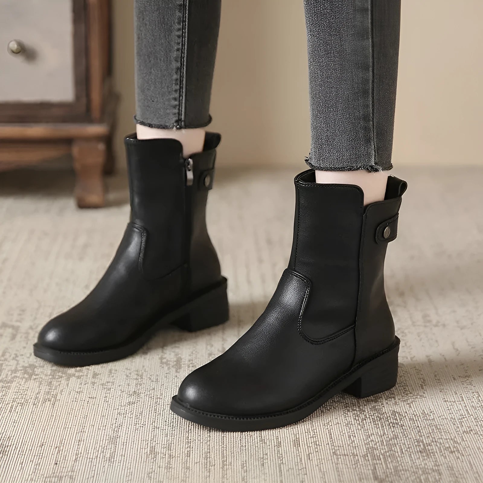 Women's black low heel ankle boots with side zip and round toe