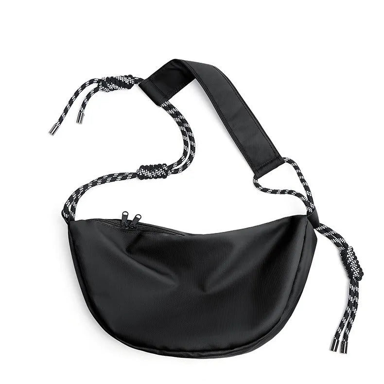 Men's large capacity commuter messenger bag in solid colour nylon with urban simplicity style
