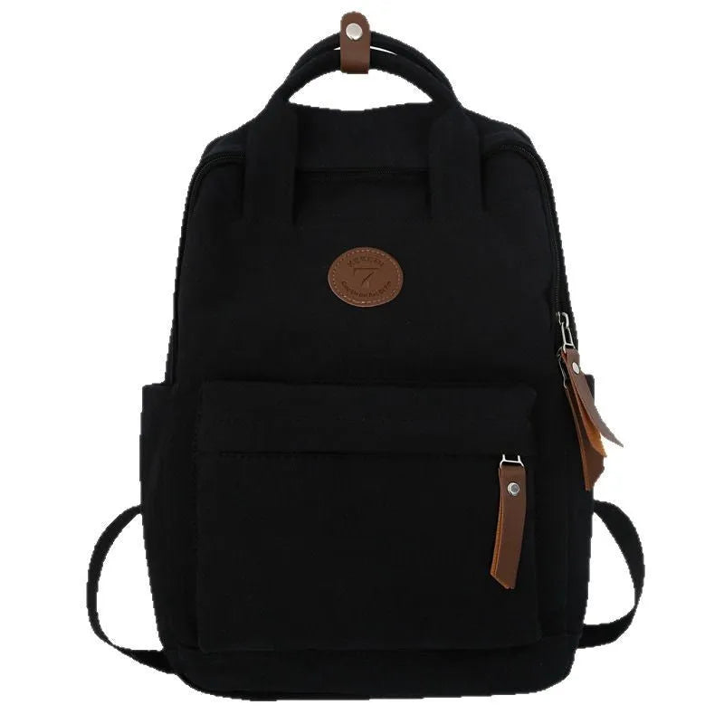 Black Oxford cloth fashion backpack with curved shoulder straps and retro sewing thread details