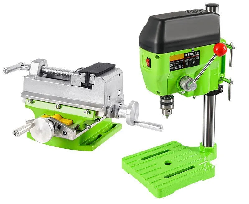 Mini bench drill and milling machine with heavy-duty cross bench pliers on workshop bench