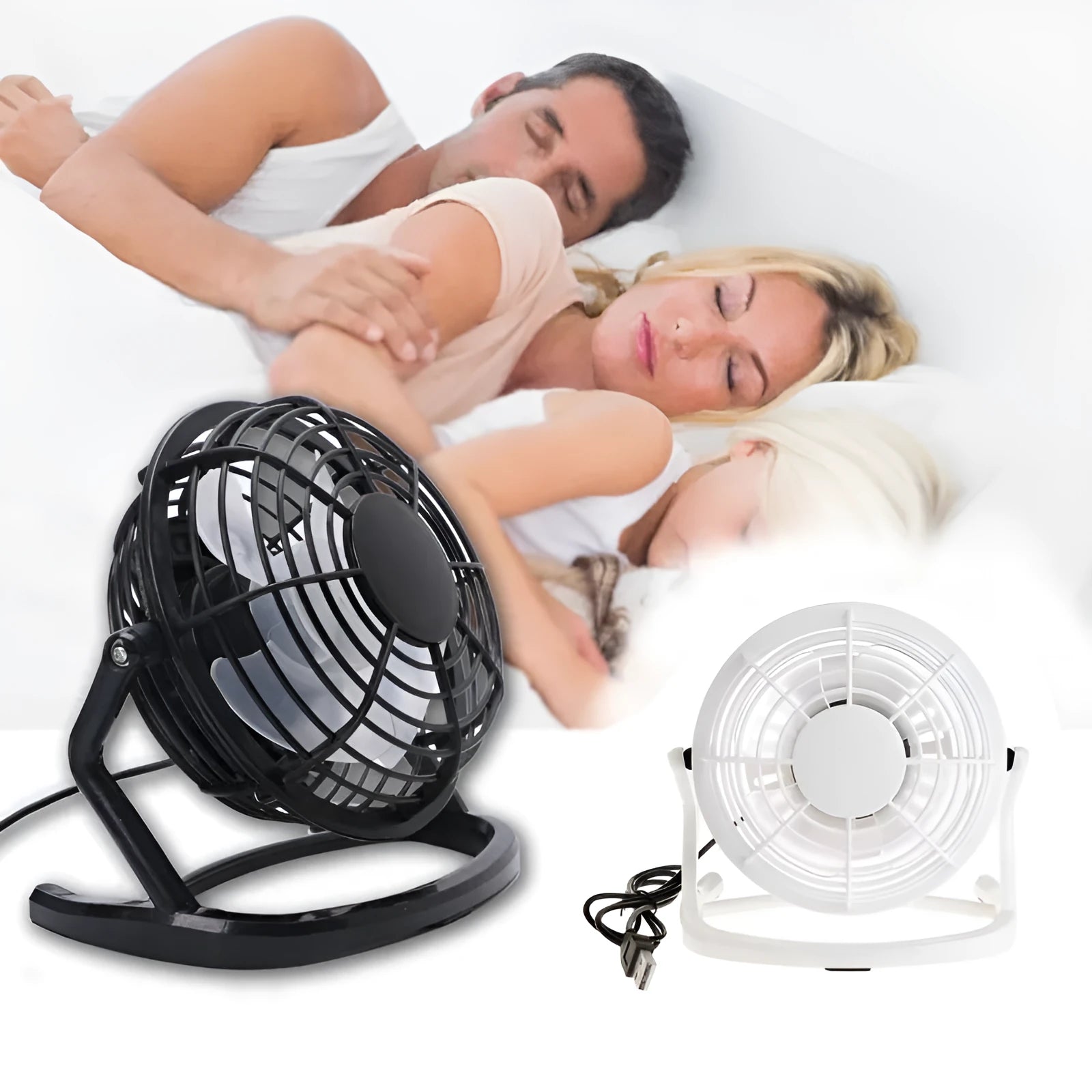Small black USB desk fan with adjustable angle on wooden desk next to laptop
