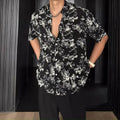 Women's loose casual short sleeve printed shirt with floral pattern in black or white colours