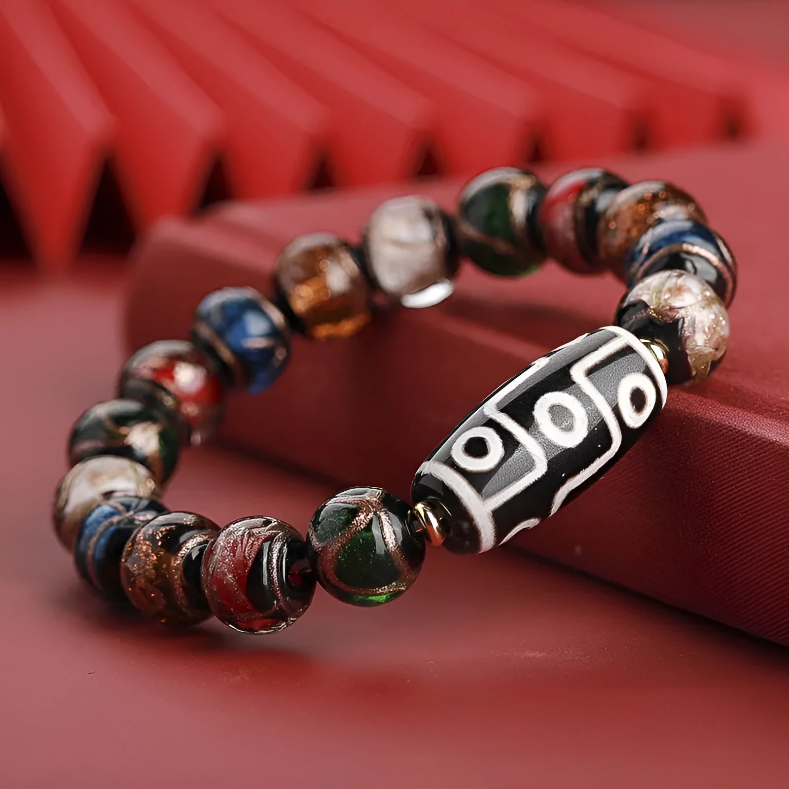 Handmade Chinese-style coloured glaze bracelet with five-colour snake lucky beads in auspicious patterns.