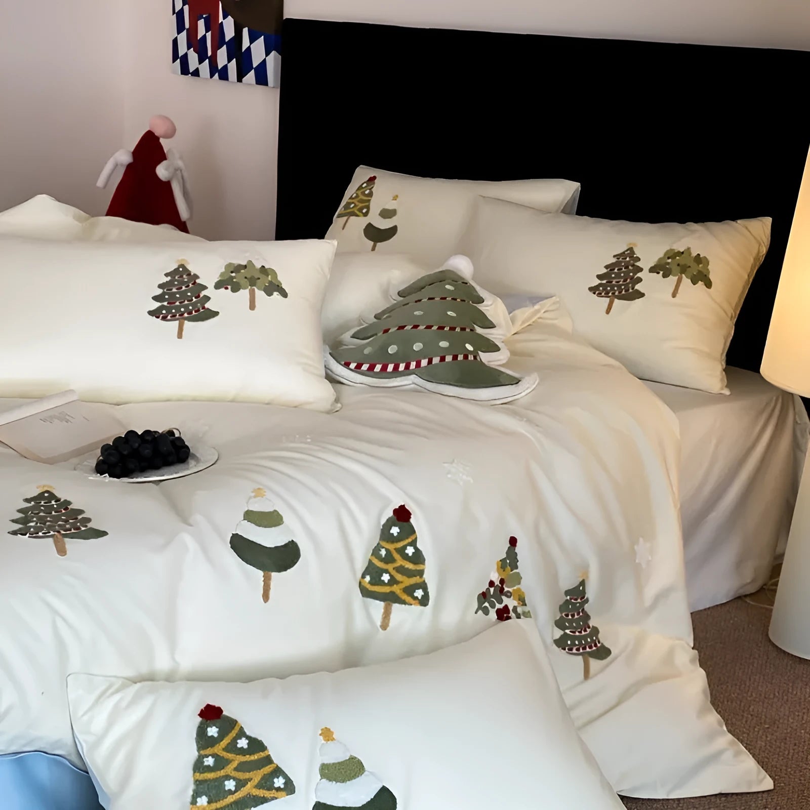 Cream blue embroidered Christmas tree and flowers on a cotton duvet cover with matching pillowcases