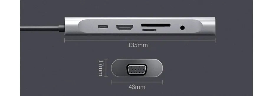 Grey aluminium USB-C docking station showing HDMI, VGA, USB 3.0, and USB-C PD ports with a short attached cable.