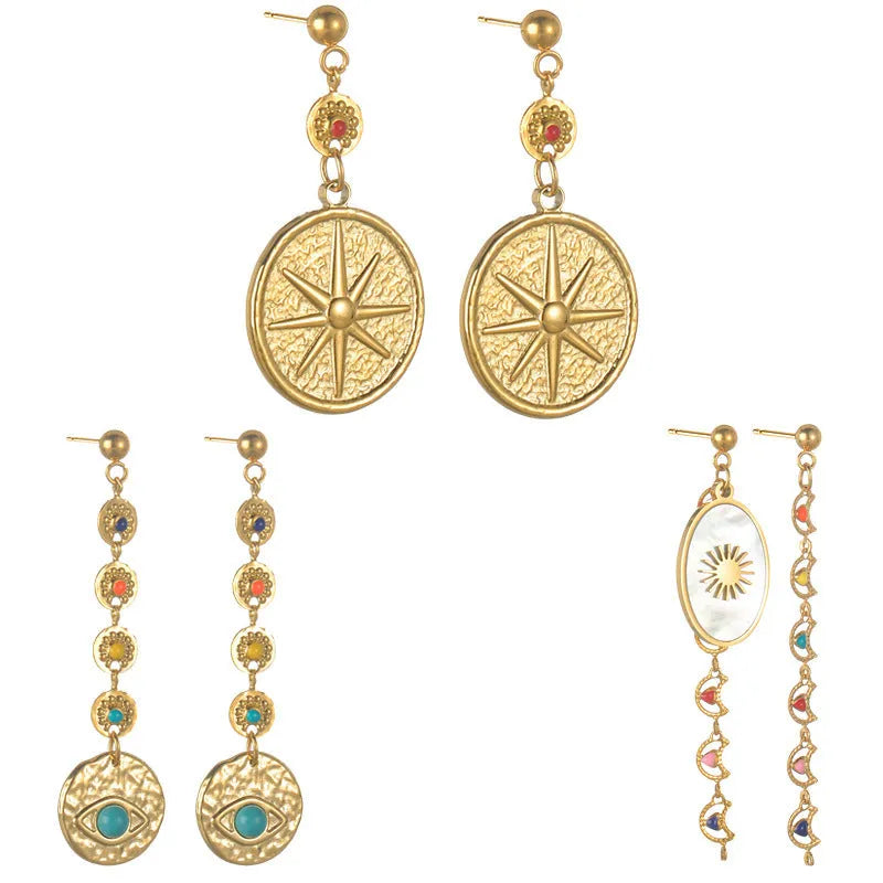 Stainless steel geometric drop earrings showing Eight Awn Star, Eye, and Shell Sun design options.