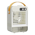 Dark green portable USB desktop air humidifier with brushless motor on a wooden desk.