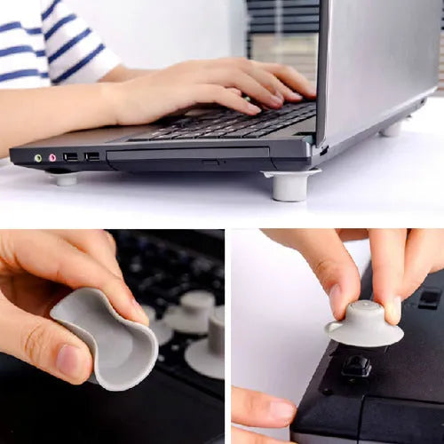 Grey plastic laptop cooling pads, two large and two small, placed under a mini notebook.