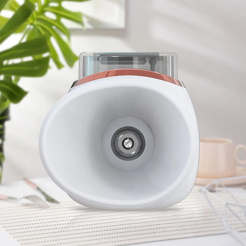 White and purple portable eye humidifier device with USB charging cable on white background