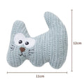 Knitted plush catnip toy with bell in cyan colour, shown next to a 12 cm ruler for scale