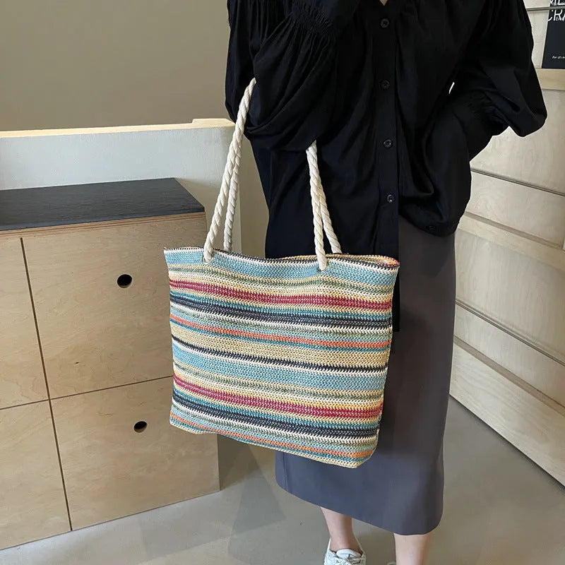 Blue woven nylon single-shoulder bag with straw-inspired texture pattern