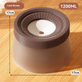 Green PP silicone suspended pet water bowl for dogs and cats on a white background