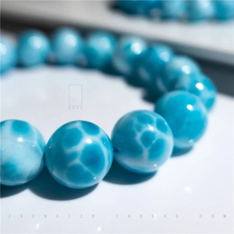 Blue bodhi bracelet with natural crystal sea-pattern stones and pearl accents in Maillard style