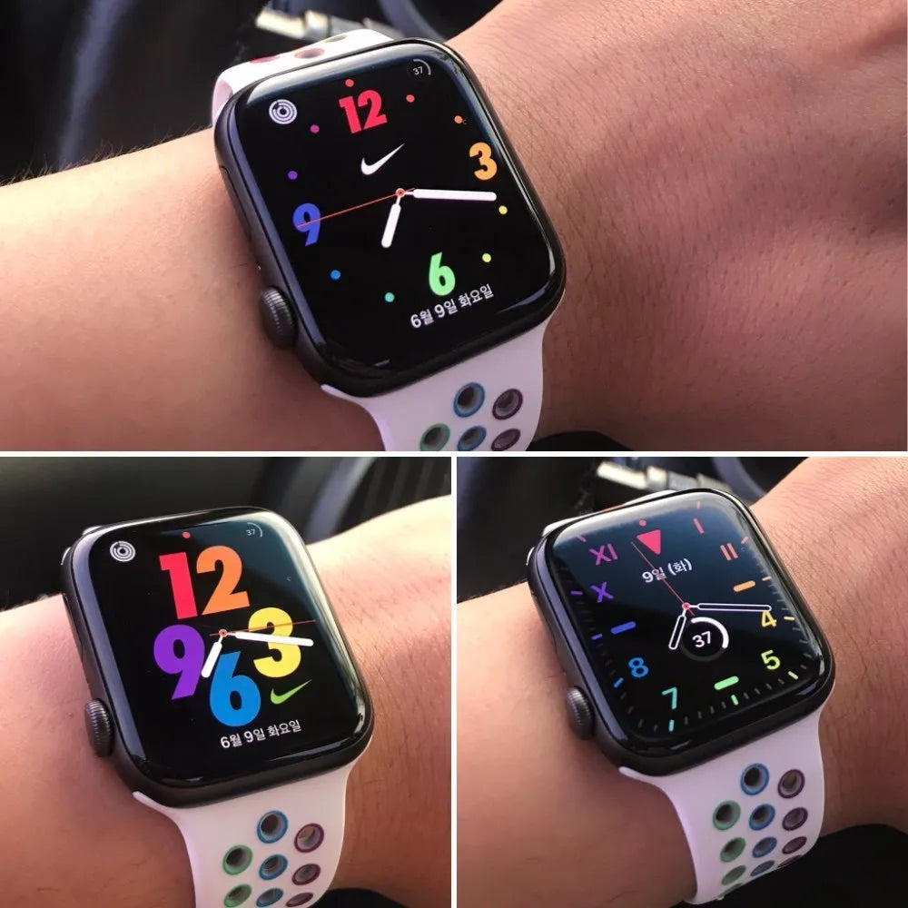 Silicone sports wristband in black, rainbow or white colours showing buckle strap closure