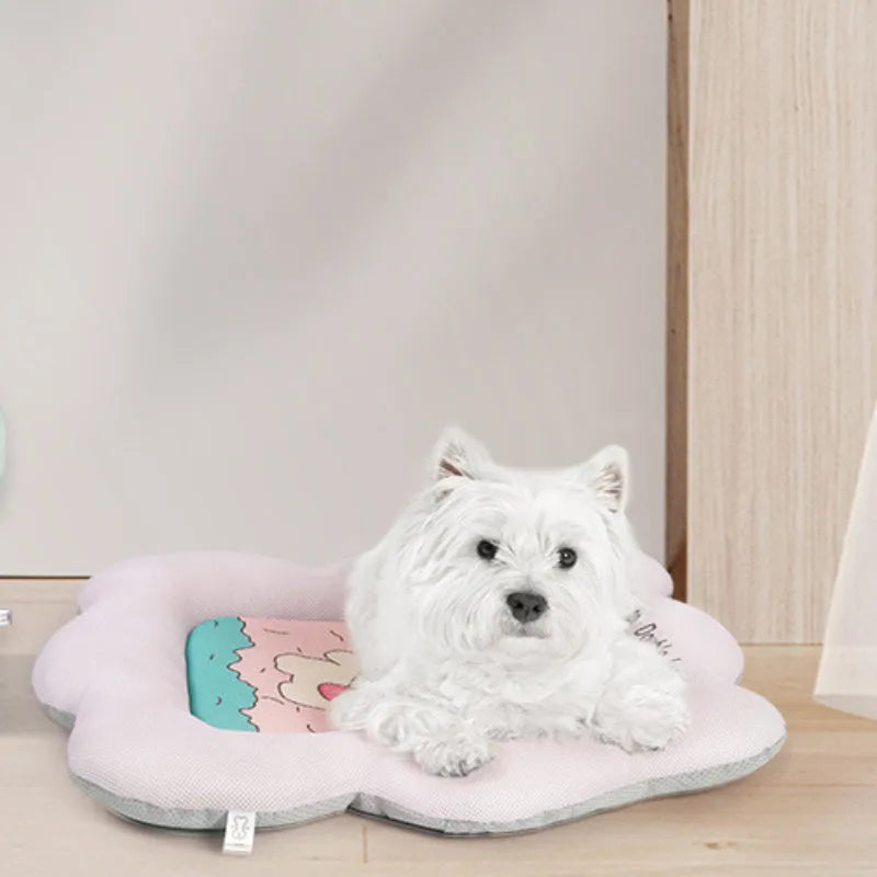 Green ice silk pet cooling mat for a dog, showing size options S, M, L, XL.