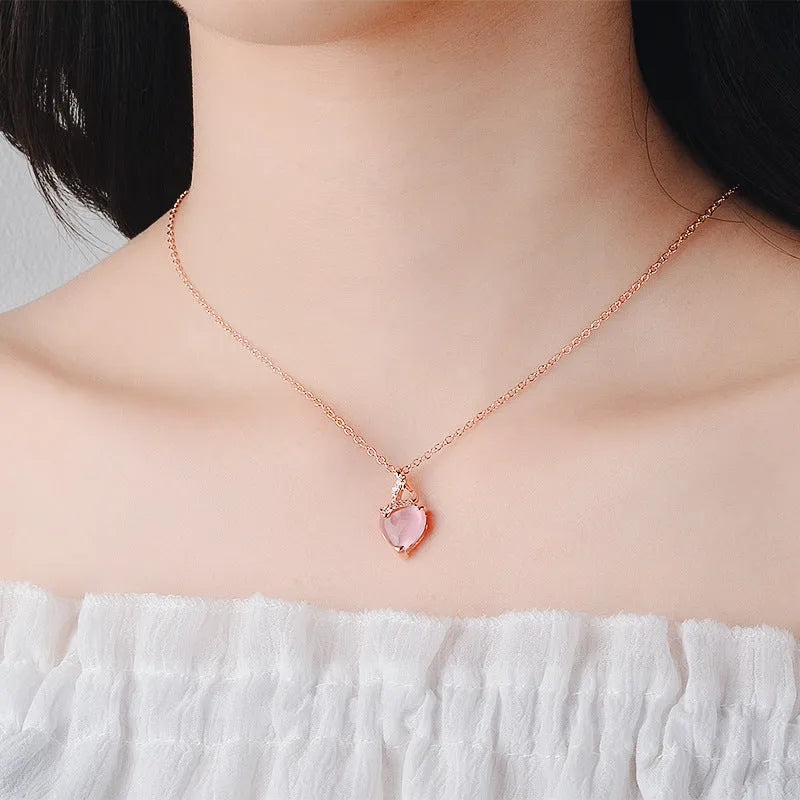 Rose gold heart-shaped crystal pendant necklace with cross chain for women