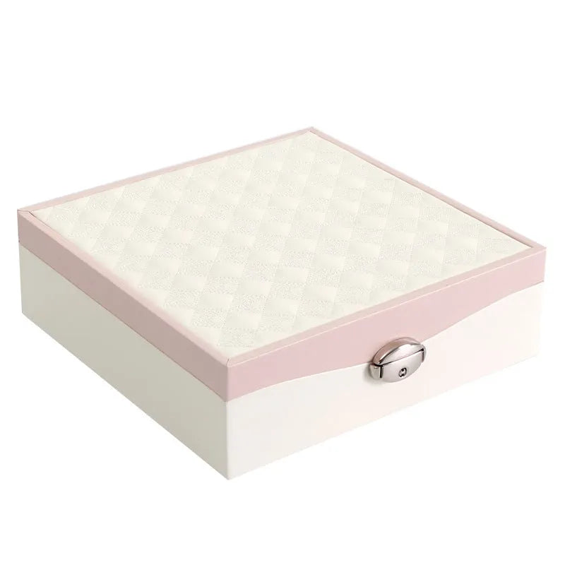 Red jewellery storage box with separate compartments for necklaces and rings
