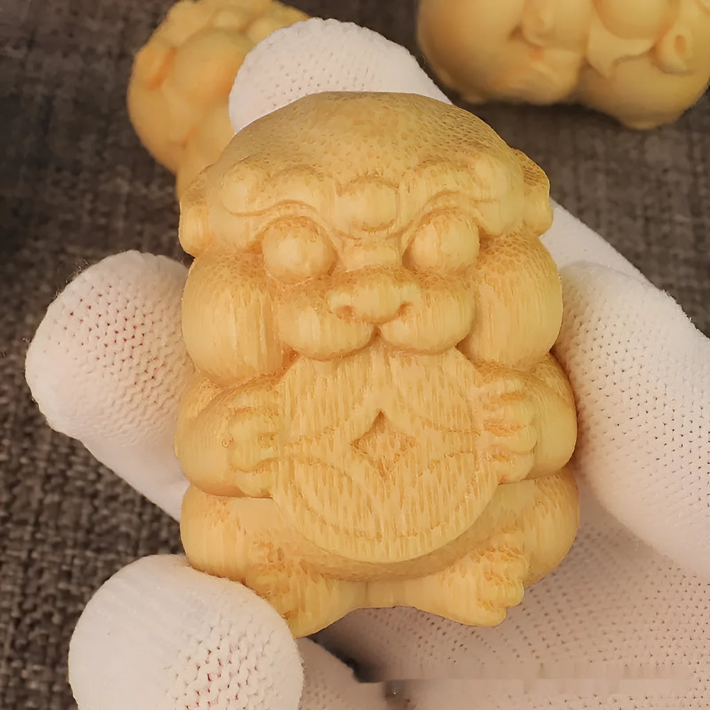 Small solid bamboo carving ornament measuring 4.5cm tall on a wooden surface.
