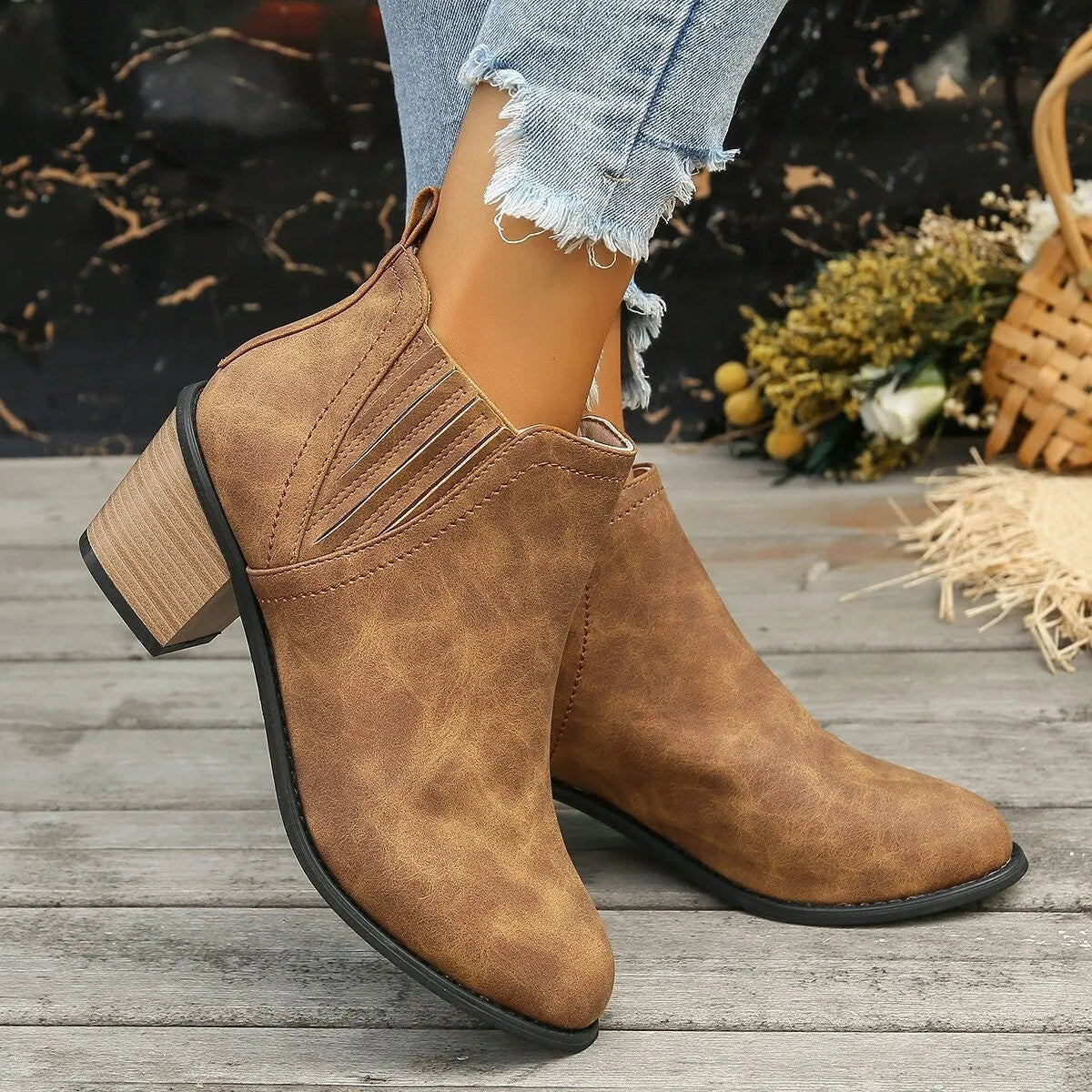 Women's black pointed toe ankle boots with thick square low heel slip-on design