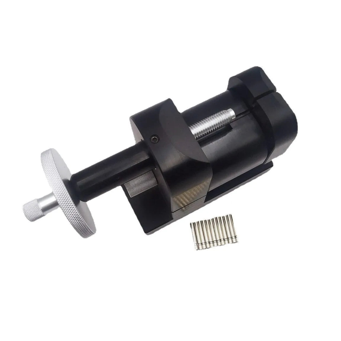 Alloy steel watch strap stripping machine and tool set for watch repair.