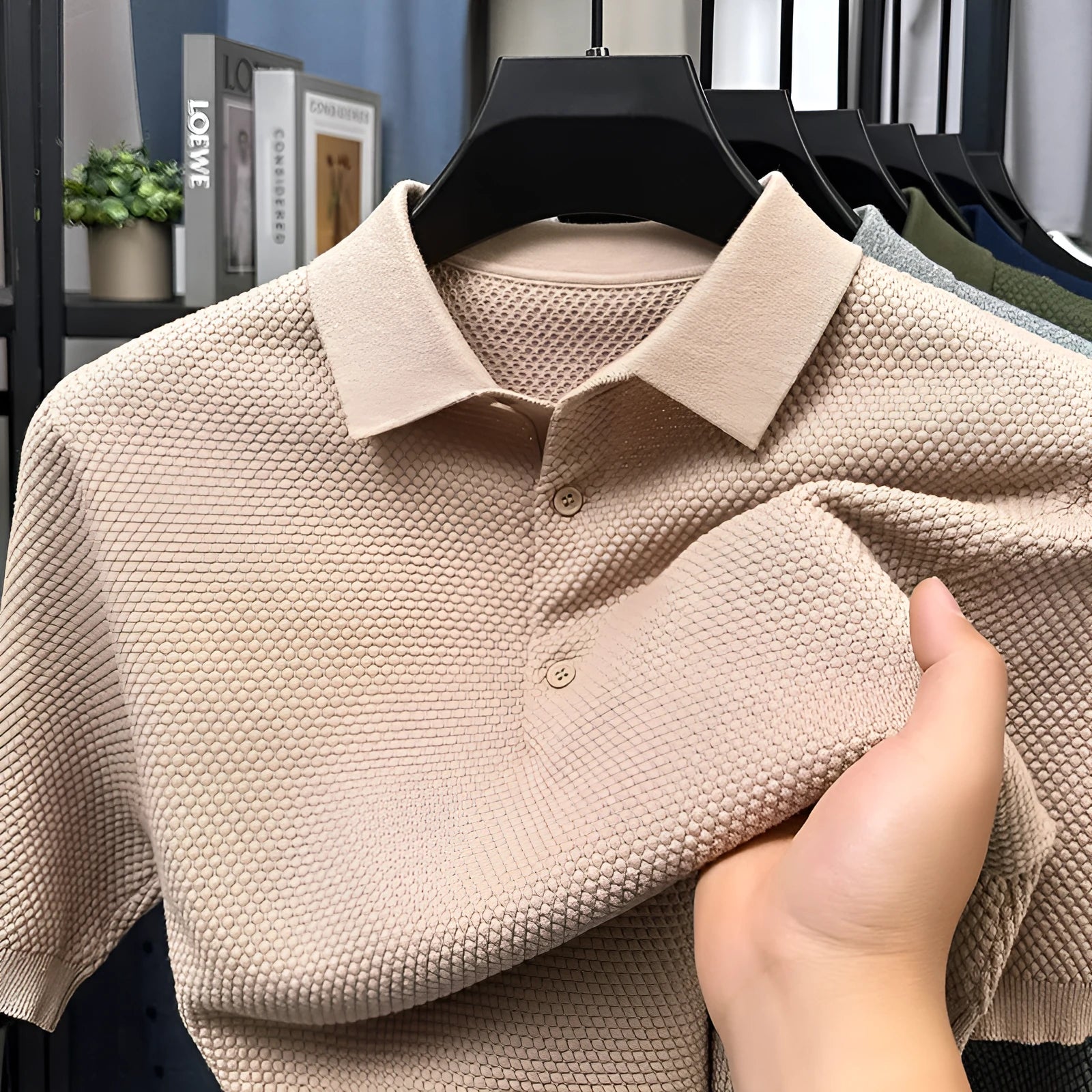 Men's loose fit short sleeve cotton pullover sweater in grey, shown on a model.