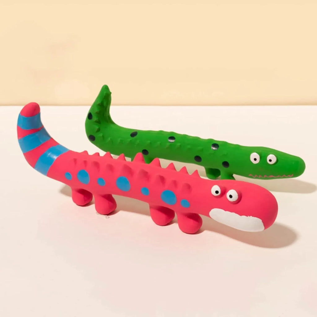 Green lizard-shaped dog chew toy with textured surface for teeth cleaning and squeaker inside