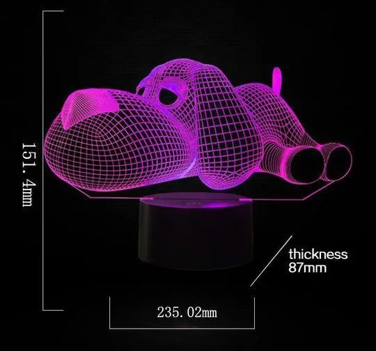 Glowing 3D illusion dog desktop night light showing multiple colour options on a desk.