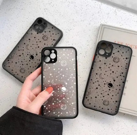 Black and white iPhone cases with soft touch surface showing raised edge protection
