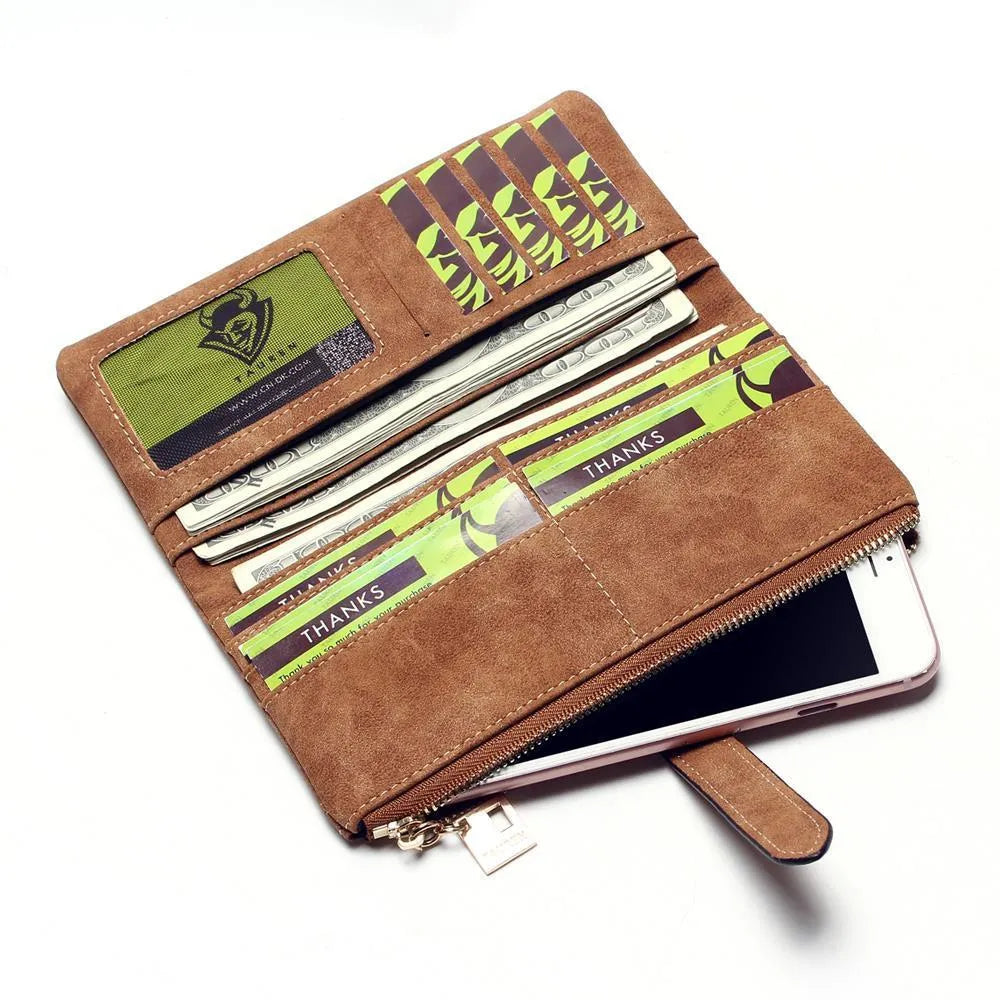 Long vertical women's wallet in matte PU leather with a central zip, shown open to reveal card slots and a phone pocket.