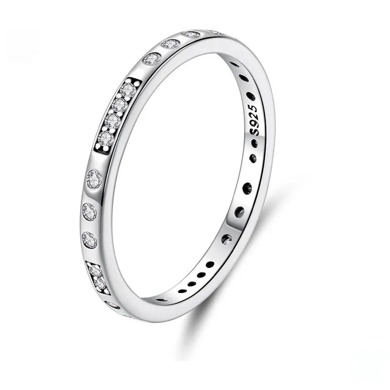 Silver ring with oxidised black moss texture and I Love You engraving on band.
