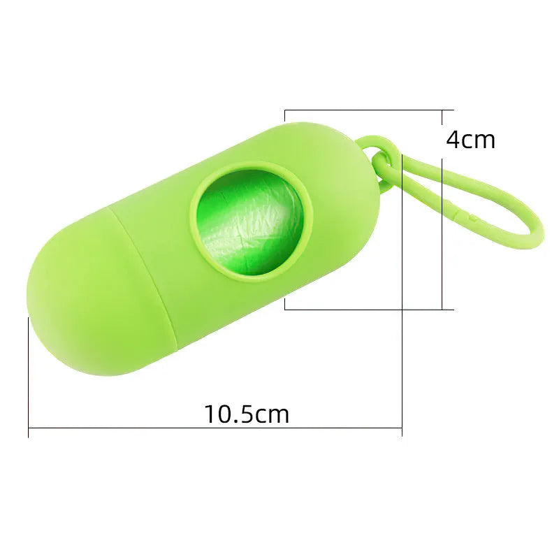 Compact dog waste bag dispenser with clip hook showing Velcro fastening for securing waste bag rolls