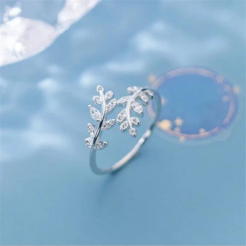 Women's copper leaf branch ring with geometric design in gold or silver electroplated finish