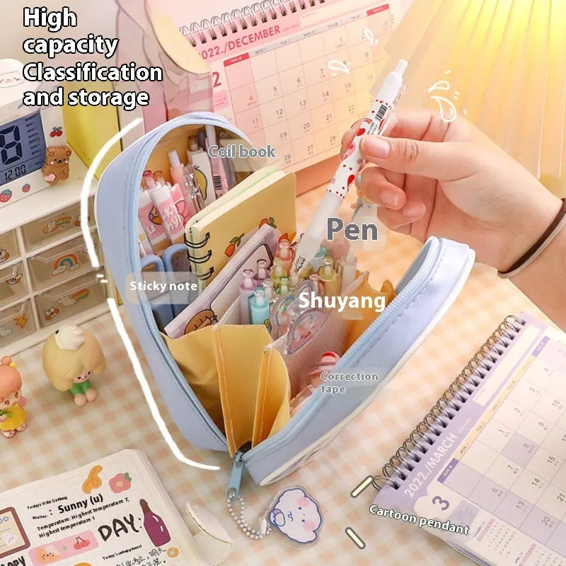 Transparent PVC pencil case with cartoon design showing large capacity interior and zipper closure