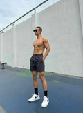Men's ice silk quick-drying double-layer shorts in six colours with size tags showing M L XL 2XL 3XL